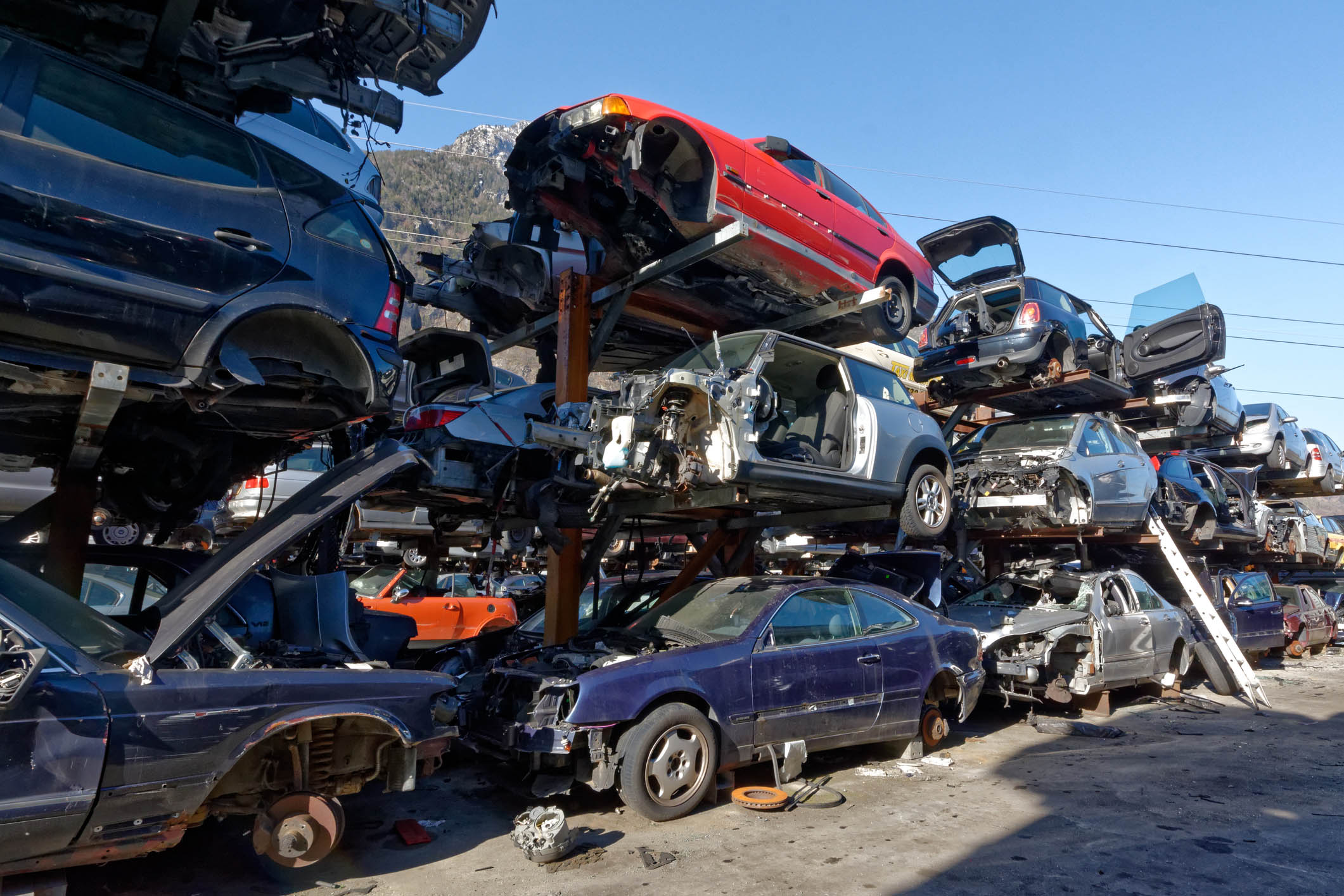 Valais, Switzerland, 21.02.2019, Recycling of old,used, wrecked cars. Dismantling for parts at scrap yards and sending for remelting